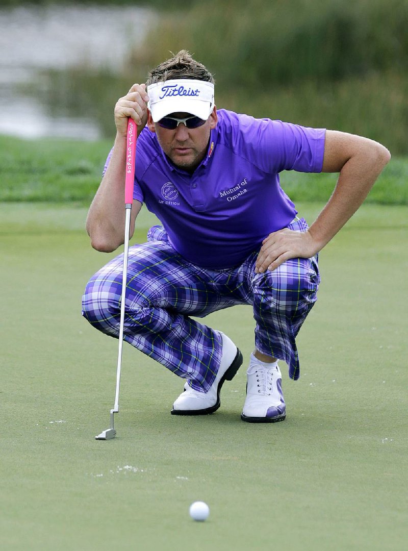 Ian Poulter looks at his line on the second green during the third round of the Honda Classic golf tournament, Sunday, March 1, 2015, in Palm Beach Gardens, Fla. (AP Photo/Luis M. Alvarez)