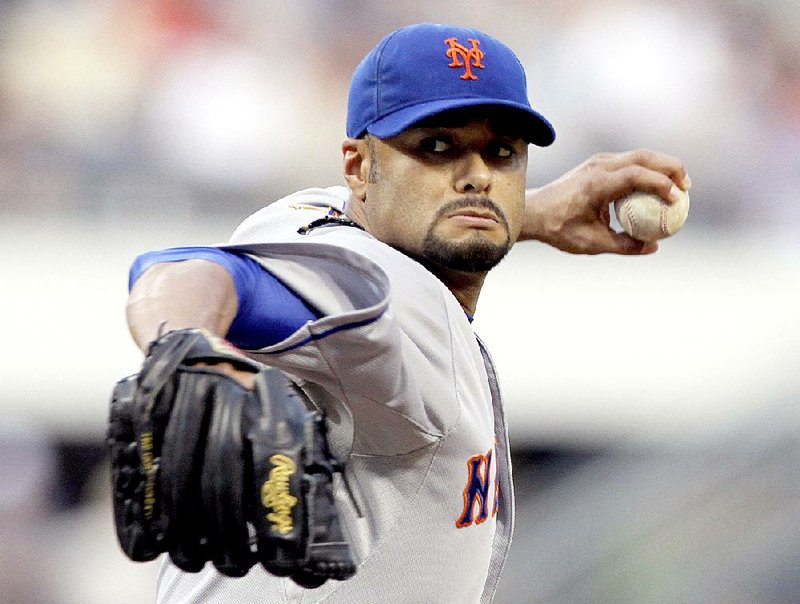 FILE - In this May 21, 2012, file photo, New York Mets starting pitcher Johan Santana throws against the Pittsburgh Pirates in the first inning of the baseball game in Pittsburgh. Santana threw the first no-hitter in Mets' history on Friday, June 1, 2012. (AP Photo/Keith Srakocic, File)