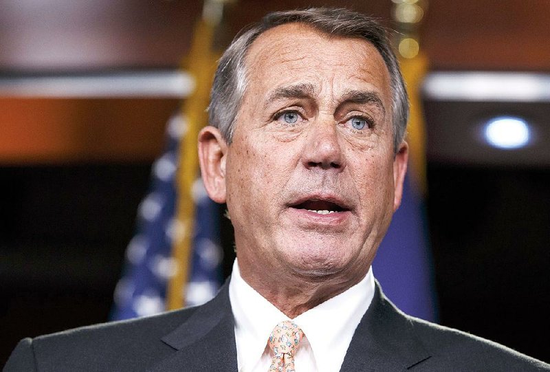 Speaker of the House John Boehner, R-Ohio, responds to reporters about the impasse over passing the Homeland Security budget because of Republican efforts to block President Barack Obama's executive actions on immigration, at the Capitol in Washington, Thursday, Feb. 26, 2015. The House voted last month to end Homeland Security funding on Saturday unless Obama reverses his order to protect millions of immigrants from possible deportation. After Democratic filibusters blocked the bill in the Senate, the chamber's Republican leaders agreed this week to offer a "clean" funding measure, with no immigration strings attached.  (AP Photo/J. Scott Applewhite)