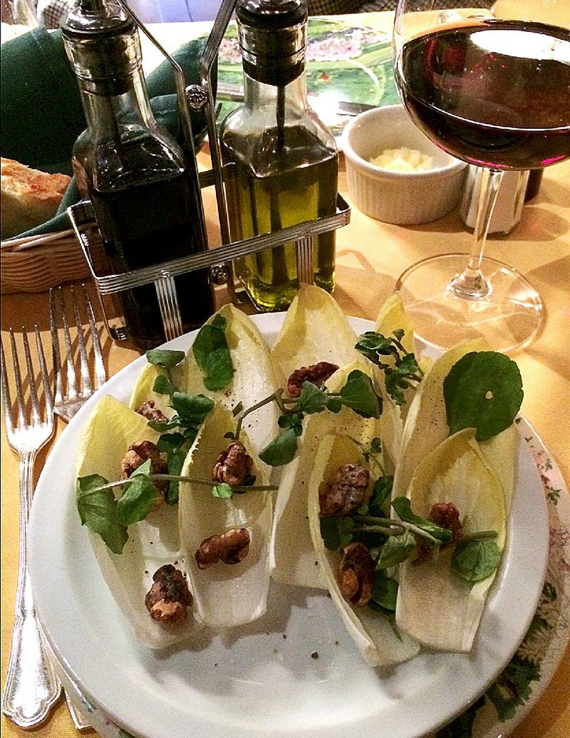 Arkansas Democrat-Gazette/BOBBY AMPEZZAN
Speaking of living to eat, during his vegan diet phase, Bobby Ampezzan threw himself on the mercy of the chef at a Little Rock restaurant and this is part of what he whipped up, an endive salad.