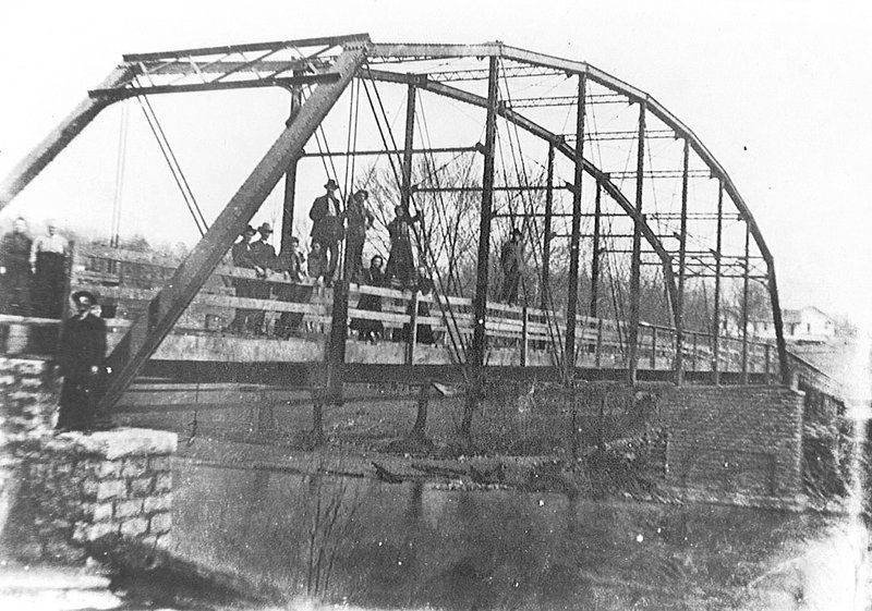 Courtesy photo/ROGERS HISTORICAL MUSEUM The War Eagle Bridge is shown about 1910. The 182-foot steel bridge, with 40-foot approach, was to be built and cost Benton County $4,790.