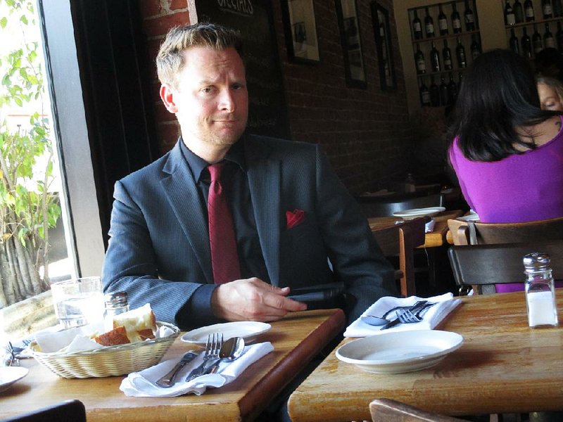 Los Angeles, Ca - Brian sits at a table next to the window at the restaurant and patiently waits for his server to arrive. He is going to try to get better service than Jason, who is across the restaurant.‚Ä®‚Ä®(photo credit:  National Geographic Channels/Alex Byrnes)