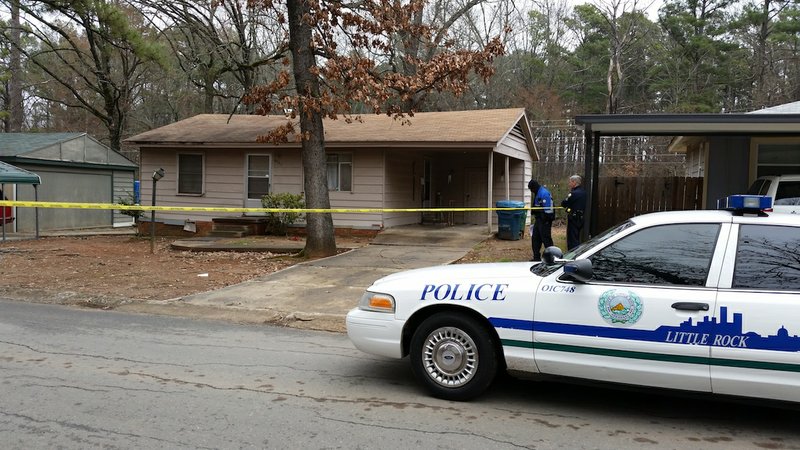 Police work at the scene of a burglar shooting on Wakefield Drive in Little Rock on Tuesday, March 3, 2015. 