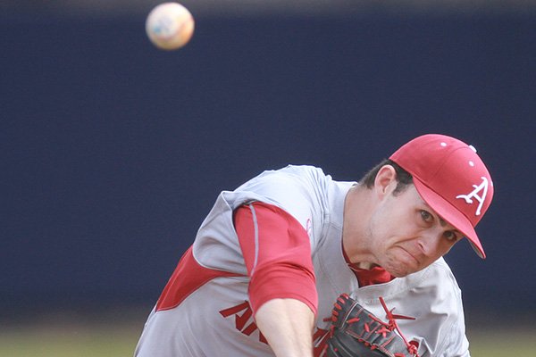 Arkansas pitcher Keaton McKinney throws a pitch during a game against Maryland on Sunday, Feb. 22, 2015, at Stanky Field in Mobile, Ala. 