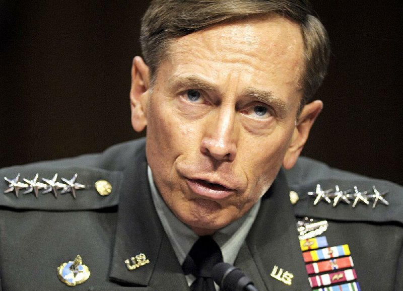 In this June 23, 2011, file photo, CIA Director nominee Gen. David Petraeus testifies on Capitol Hill in Washington, before the Senate Intelligence Committee during a hearing on his nomination. The Justice Department said Tuesday, March 3, 2015, that the former top Army general has agreed to plead guilty to mishandling classified materials. 