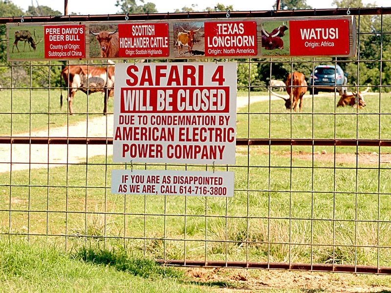 Photo by Randy Moll Signs went up at the Gentry Wild Wilderness Safari in August of 2013 because of the transmission lines to be built across a portion of Safari 4. The signs announced that this portion of the drive-through portion of the Safari would be closing when the lines were built. The lines have since been built across the property.