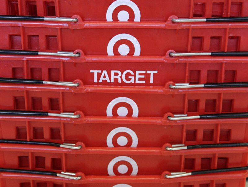  In this May 20, 2009 file photo, shopping baskets are stacked at a Chicago area Target store. Target Corp. on Tuesday, March 3, 2015 said it plans $2 billion in cost cuts over the next two years through corporate restructuring and other improvements. 