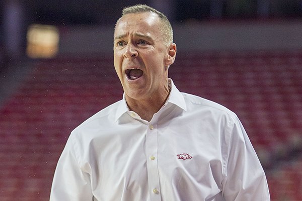 Arkansas head coach Jimmy Dykes reacts to a foul call during the first half of an NCAA college basketball game against Kentucky, Thursday, Feb. 26, 2015, in Fayetteville, Ark. (AP Photo/Gareth Patterson)