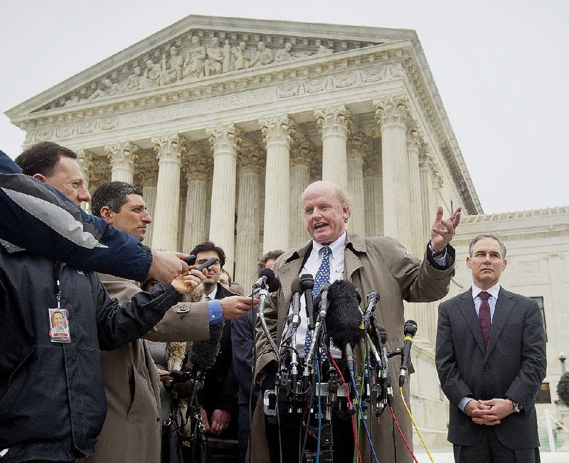Michael Carvin, lead attorney for a challenge to tax subsidies under President Barack Obama’s health care law, discusses the case Wednesday outside the Supreme Court building in Washington. 