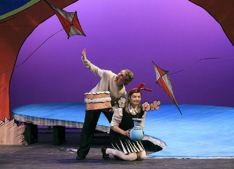 Ben Gibson (left) as Boy and Sharon Combs as Sally perform a scene from the Arkansas Arts Center Children’s Theatre production of The Cat in the Hat. 