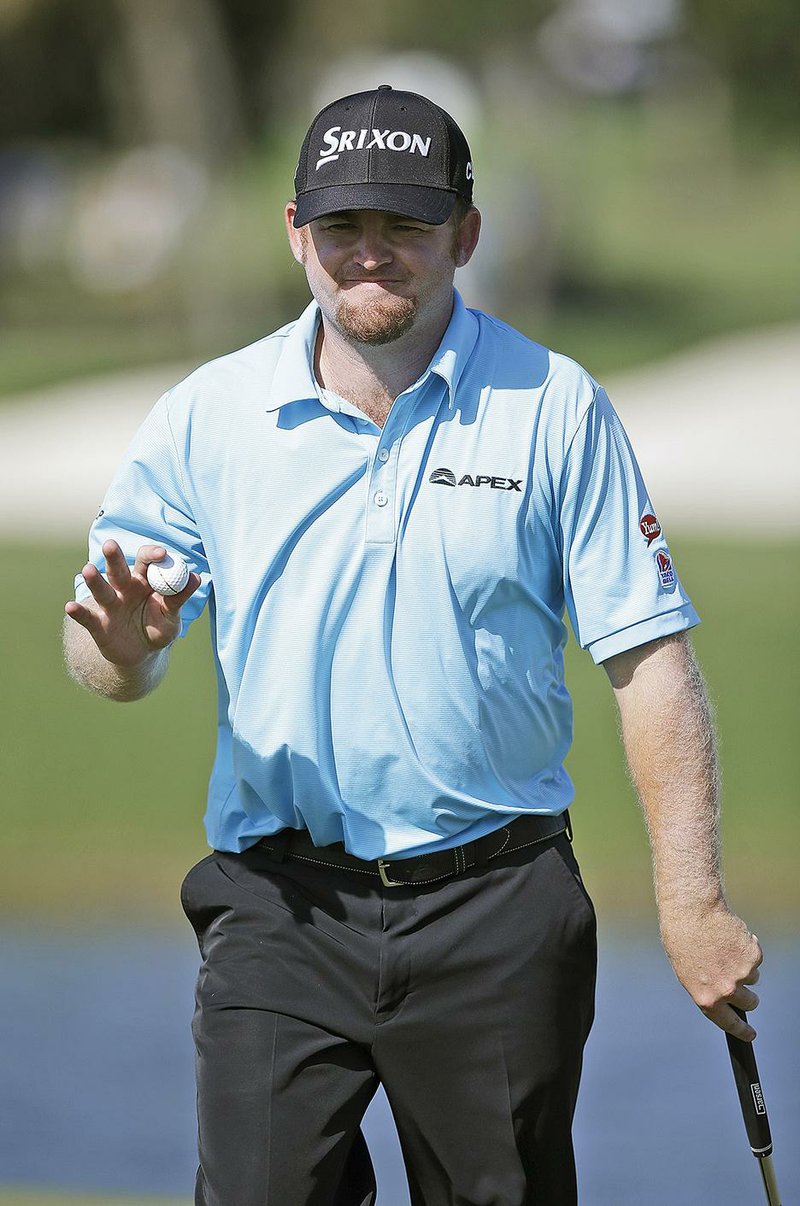 J.B. Holmes (shown) had a tap in eagle to go along with eight birdies for a 10-under 62 to build a four-shot lead after the first round of the Cadillac Championship in Doral, Fla. It wasn’t that good for the world’s No. 1 player. Rory McIlroy shot a 40 on his opening nine, then rallied for a 1-over 73. McIlroy has yet to break par in his first three rounds in the United States this year.