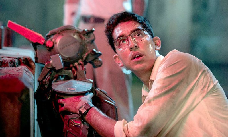 Johannesburg police force artificial intelligence engineer Deon (Dev Patel) creates a sentient robot in Neill Blomkamp’s technological thriller Chappie.