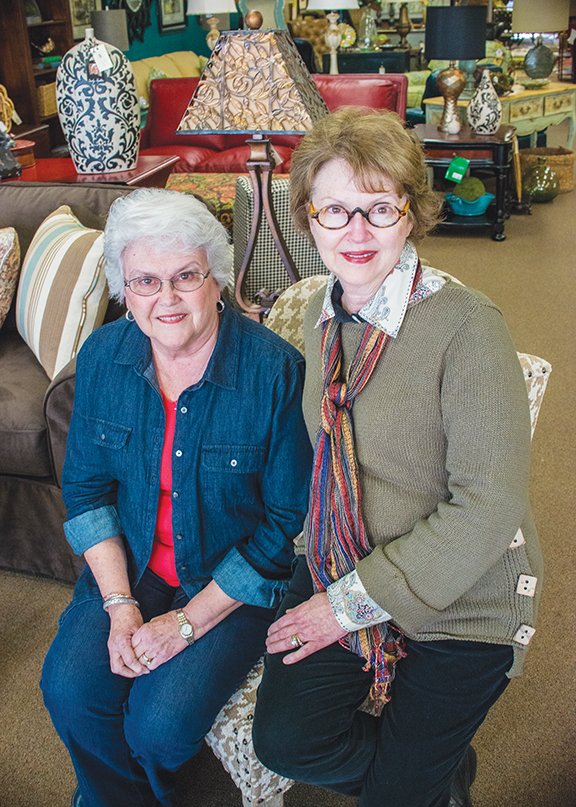 Betty Mote, left, and Nancy Hatfield pose for a photograph inside their family’s furniture store in Searcy, Sowell’s Furniture, which is celebrating its 70th year in business.