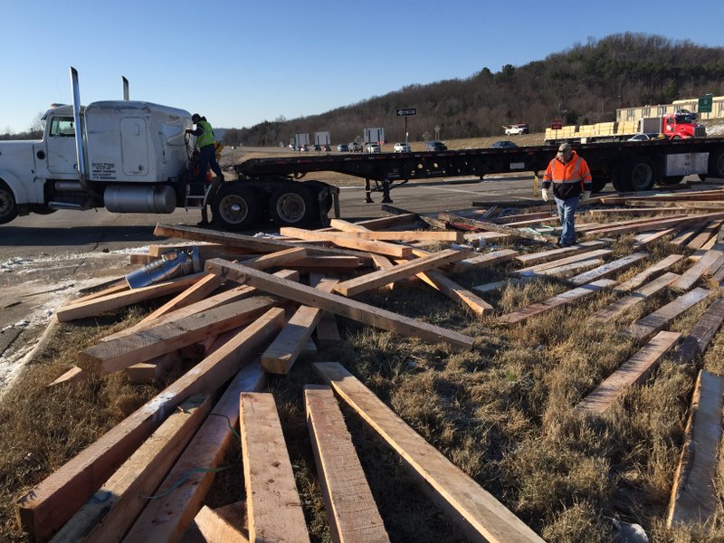 A truck spilled lumber on an I-49 ramp Friday.