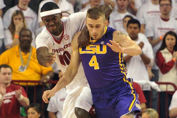 Arkansas forward Bobby Portis and LSU defender Keith Hornsby fight for the ball during the first half of the LSU game Saturday, March 7, 2015, at Bud Walton Arena in Fayetteville.