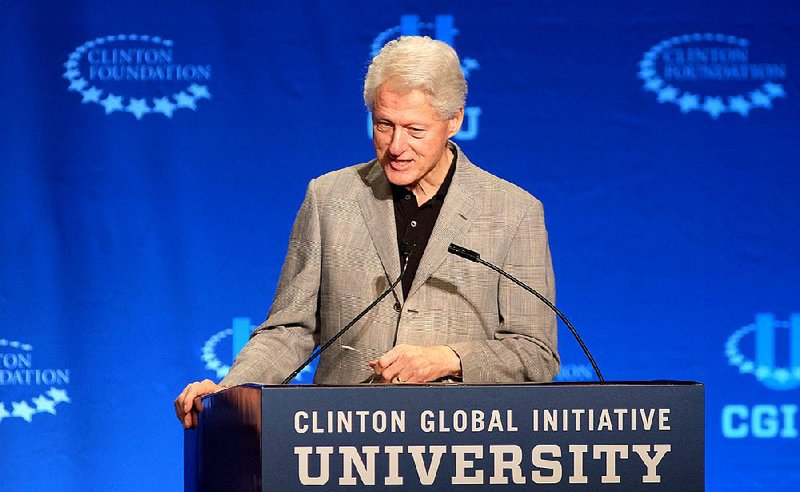 Former President Bill Clinton, speaks the Future of Energy session at a university conference sponsored by the Clinton Global Initiative on Saturday, March 7, 2015 in Coral Gables, Fla. (AP Photo/Gaston De Cardenas)