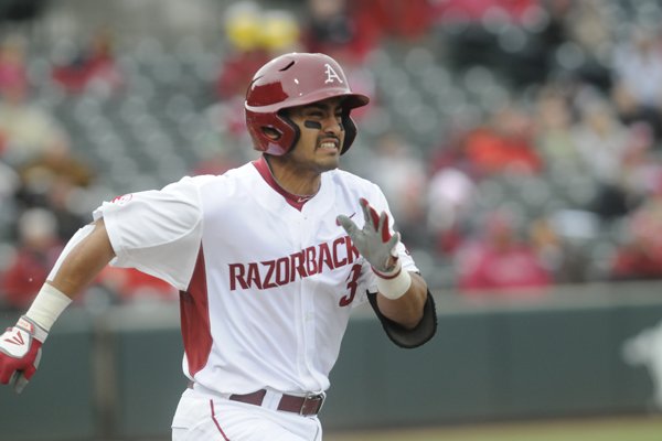 Arkansas' Michael Bernal tries to get to first base against Loyola Marymount Sunday, March 8, 2015.