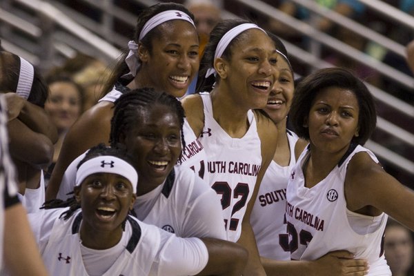 South Carolina's bench reacts as their team continues to in crease their lead against Tennessee in the 2nd half during their SEC championship game March 8, 2015 at Verizon Arena in North Little Rock. 