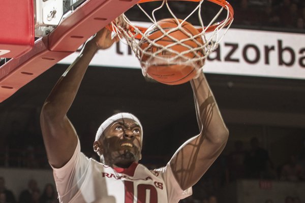 Bobby Portis, Arkansas sophomore, dunks against Texas A&M in the second half Tuesday, Feb. 24, 2015 at Bud Walton Arena in Fayetteville. The Hogs won 81-72.