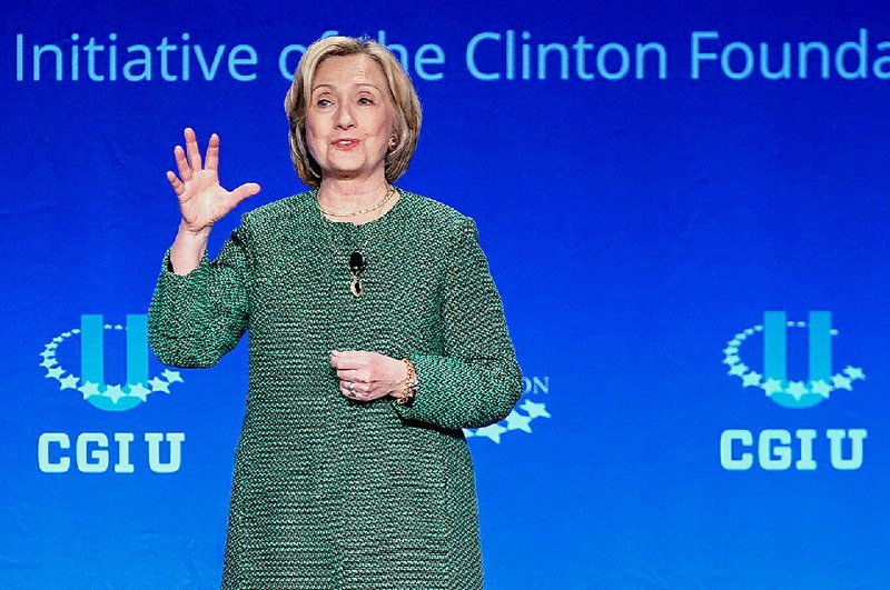 Former Secretary of State Hillary Rodham Clinton speaks at a university conference sponsored by the Clinton Global Initiative at the University of Miami, Saturday, March 7, 2015, in Coral Gables, Fla. (AP Photo/Gaston De Cardenas)