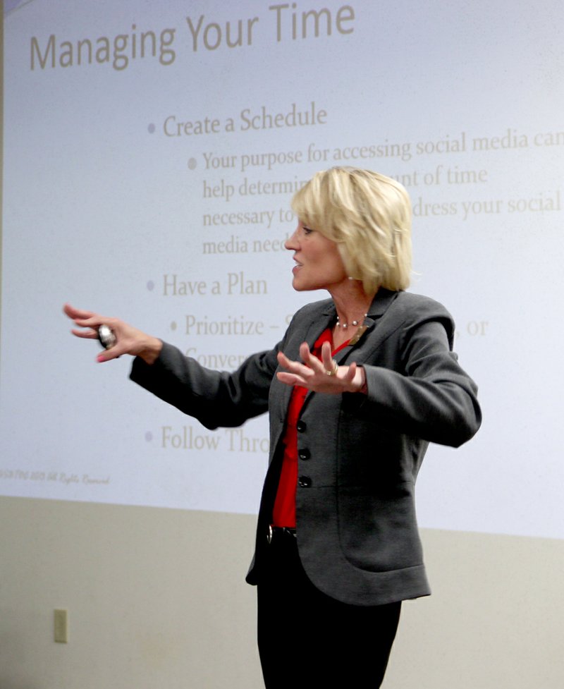 LYNN KUTTER ENTERPRISE-LEADER Martha Londagin with Arkansas Small Business and Technology Development Center with University of Arkansas leads a workshop on social media and marketing plans at Farmington City Hall. The seminar was sponsored by Farmington Area Chamber of Commerce.