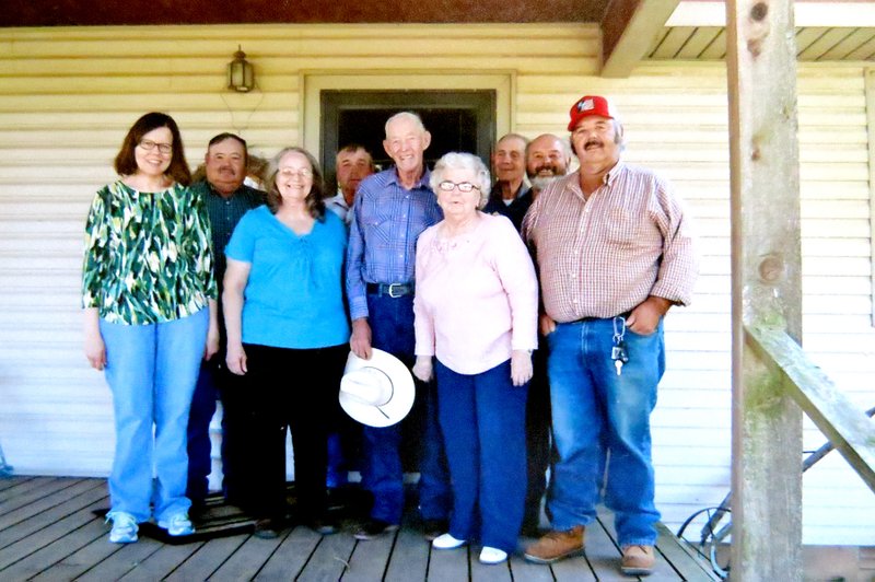 Submitted Photo Dean Amos (center) and his family pose together for a family photo: Marilyn Gosnell (front, left), Carolyn Mercer, Dean Amos, Sylvia Amos, Jerald Amos, Harvey Amos (back, left), Lester Amos, Clark Amos and Merrill Amos.