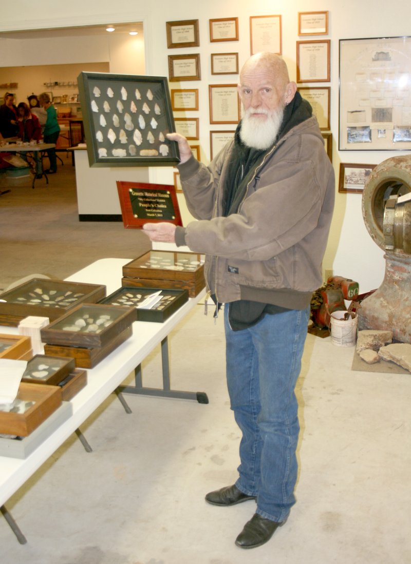 Photo by Steve Mitchael Stephen Varner of Bentonville displays the &#8220;People&#8217;s Choice&#8221; plaque he won at Saturday&#8217;s &#8220;My Collections&#8221; event. He won for his collection of arrowheads. Stephen is a cousin of the late Johnny Varner who was a barber in Gravette for many years and had the idea for the diorama depicting the town which is on display at the museum.