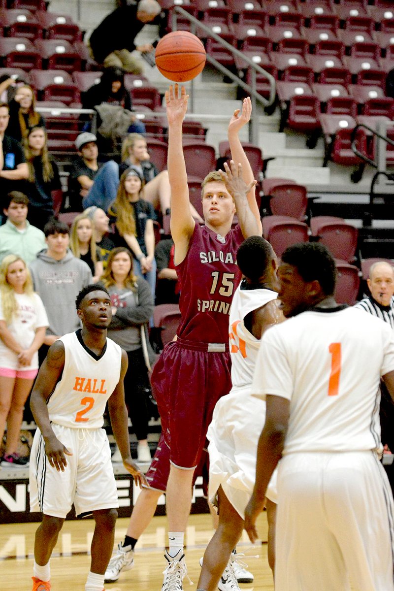 Bud Sullins/Special to the Herald-Leader Siloam Springs senior Brandon Johnson knocks down a jump shot during the Panthers&#8217; 65-48 loss to Little Rock Hall on Sunday in the 6A state basketball tournament at Panther Activity Center.