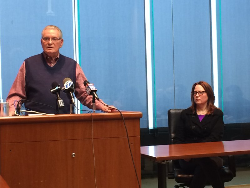 Roger Glasgow, left, speaks at a press conference about the discovery of his brother John Glasgow's skull at Petit Jean Mountain State Park as John Glasgow's wife, Melinda, looks on. 