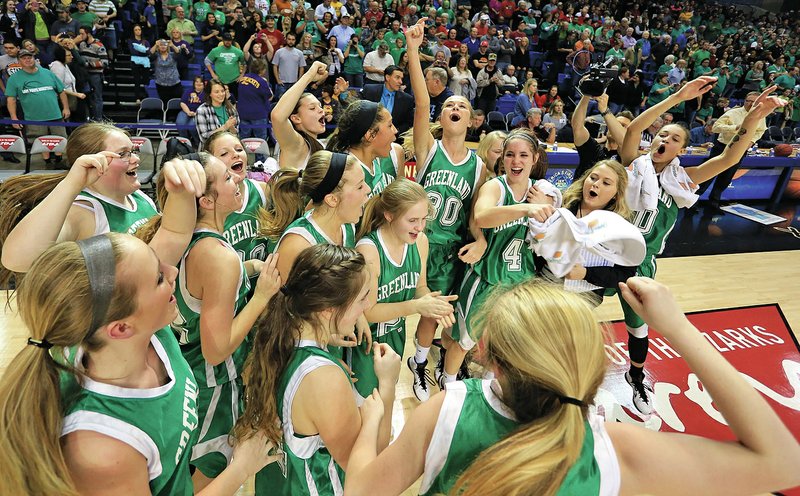 Arkansas Democrat-Gazette/RICK MCFARLAND Greenland players celebrate their victory Thursday over Valley Springs in the 3A finals of the Girls&#8217;s State High School Basketball Championships in Hot Springs.
