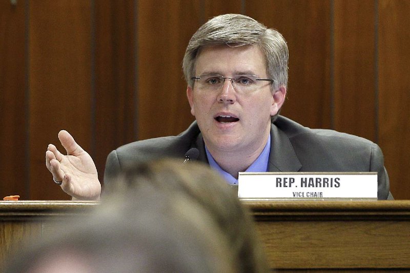 Rep. Justin Harris, R-West Fork, asks a question Friday in the House Committee on Aging, Children and Youth, Legislative and Military Affairs. Harris is vice chairman of the panel. 