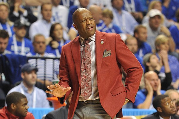 Arkansas coach Mike Anderson motions to his team during a game against Kentucky on Sunday, March 15, 2015, during the SEC Tournament at Bridgestone Arena in Nashville, Tenn.