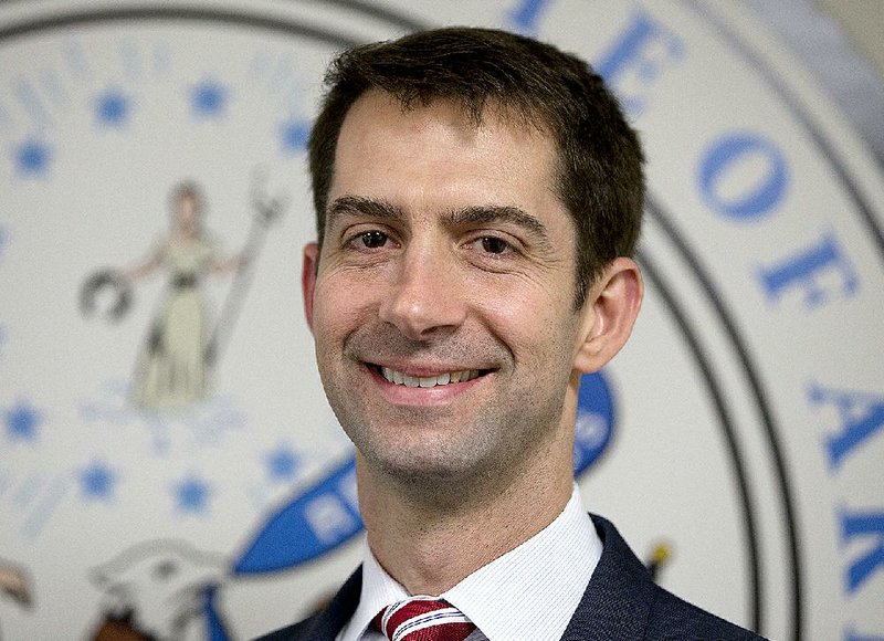 Sen. Tom Cotton, R-Ark. arrives to pose for photographers in his office on Capitol Hill in Washington, Wednesday, March 11, 2015.   American politicians like to pick and choose when they’ll abide by the storied notion that politics should stop at the water's edge, and when to give that idea a kick in the pants.  (AP Photo/Carolyn Kaster)