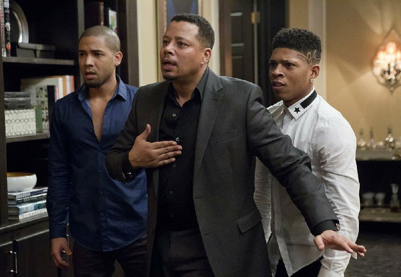 This photo provided by Fox shows, from left, Jussie Smollet as Jamal, Terrence Howard as Lucious, and Bryshere Gray as Hakeem, in a scene from "Sins of the Father" episode of "Empire," airing Wednesday, March 11, 2015 (9:01-10:00 p.m. ET/PT) on Fox. (AP Photo/Fox, Chuck Hodes)