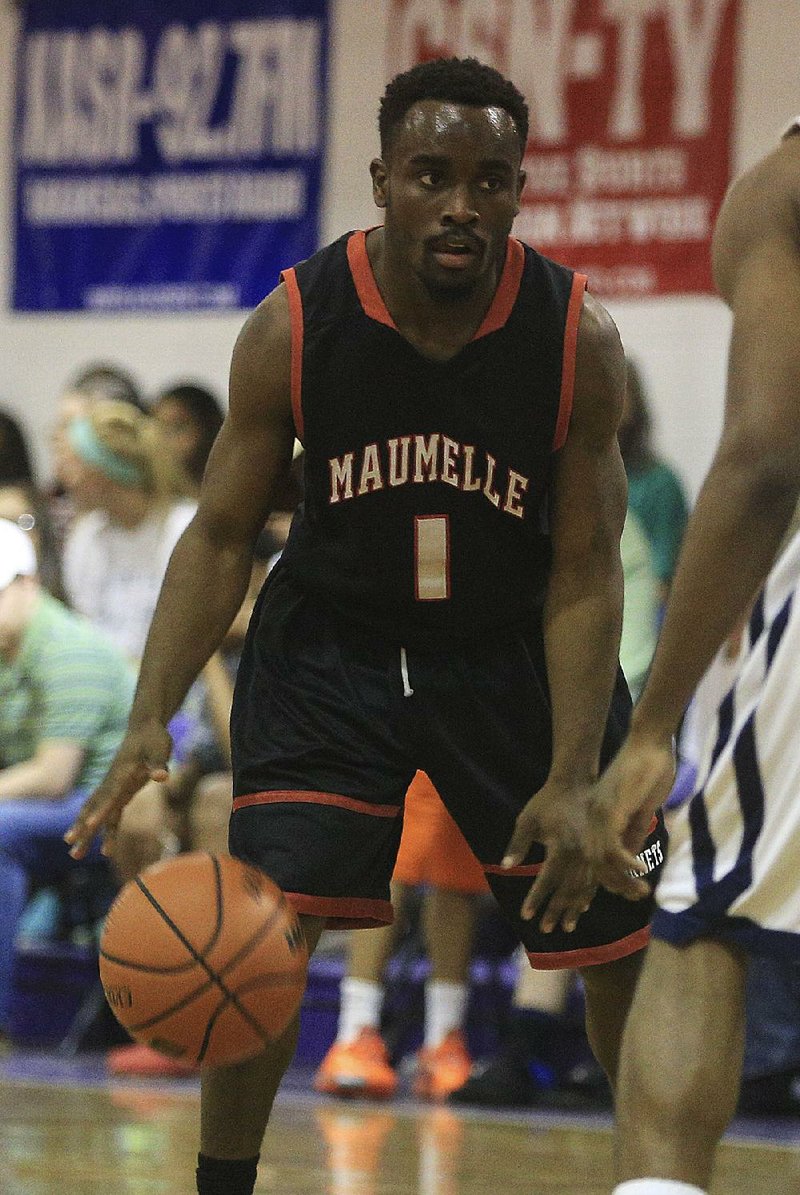 Maumelle’s J.B. Minix handles the ball for Team Shook during Tuesday’s 119-103 loss to Team Bonner in the All-Metro boys allstar game at Arkansas Baptist College in Little Rock.