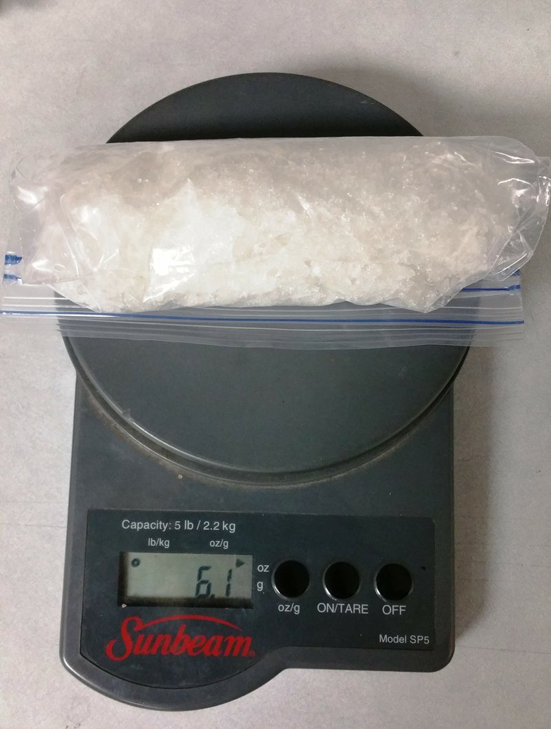 This photo released by the Benton Police Department shows more than a third of a pound of methamphetamine seized from an Alexander home.