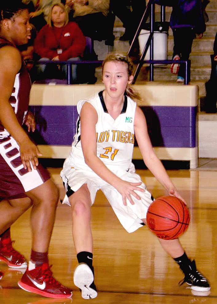 Photo courtesy of Shelley Williams Smoking gun. Prairie Grove junior Taylor Hartin scored 30 points against Crossett in State 4A girls competition on Mar. 7. Hartin made 10 of 14 field goals, including 5 of 8 3-point tries and 5 of 5 free throws.