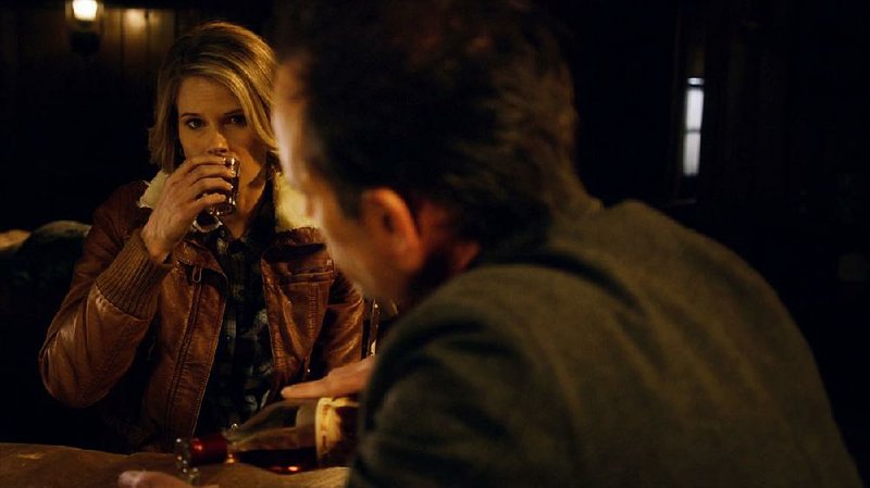 Ava Crowder (Joelle Carter) shares some 20-year-old Pappy Van Winkle with her boyfriend ‚Äî and, long story, former brother-in-law ‚Äî Boyd Crowder (Walton Goggins) in this scene from the FX series Justified.