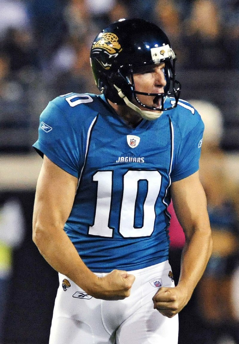 Jacksonville Jaguars kicker Josh Scobee reacts after kicking a 54-yard, second-quarter field goal against the Baltimore Ravens in an NFL football game Monday, Oct. 24, 2011, in Jacksonville, Fla. (AP Photo/Stephen Morton)