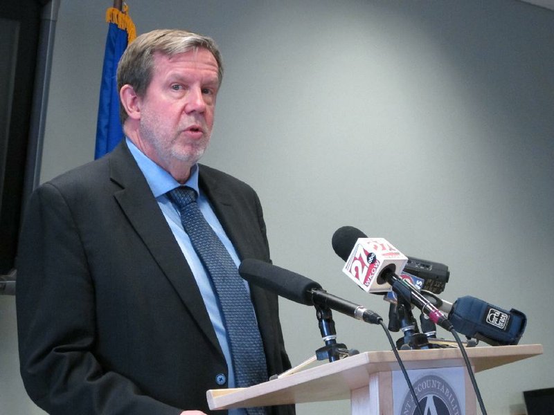 Wisconsin's chief elections official Kevin Kennedy discusses the impact of the U.S. Supreme Court's decision not to hear a challenge to the state's voter identification law on Monday, March 23, 2015, in Madison, Wis. Kennedy says it's too close to the April 7 election for voter ID to be put in place, but it will be required after that. (AP Photo/Scott Bauer)