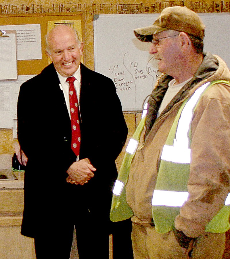 Submitted Jack Hudson, right, chats with Mayor Peter Christie on Feb. 27 at Hudson&#8217;s retirement party at the Street Department. Hudson retired Feb. 28 after 25 years of service with the Street Department.