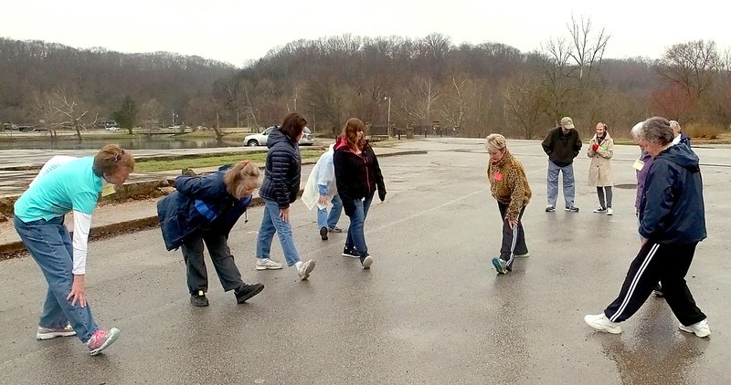 Lynn Atkins/The Weekly Vista The two-mile group warms up. They were led by Karen Kraszewski last Thursday.