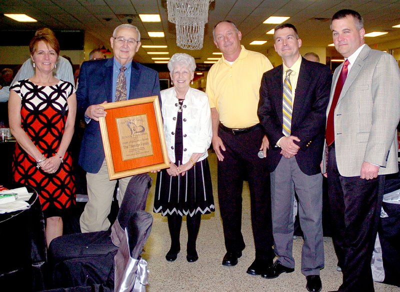 RICK PECK MCDONALD COUNTY PRESS The Thornton family was presented the Heart of Education award by Randy Smith (third from right) at the Heart of Education Banquet hosted Saturday night by the McDonald County Schools Foundation. From left to right: Suzanne Schmit, Cliff Thornton, Susie Thornton, Smith, Matt Thornton and Mike Thornton.