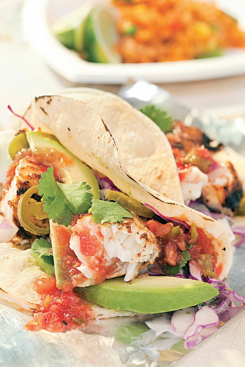 Grilled fish tacos can provide a healthier alternative to fried fish for seafood lovers.