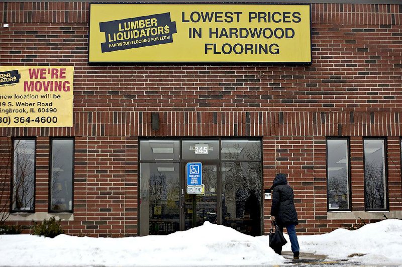 A customer enters a Lumber Liquidators Holdings Inc. store in Bolingbrook, Ill., earlier this month. Elliot Kaye, chairman of the U.S. Consumer Product Safety Commission, said it’s too early to tell whether flooring will be recalled because of an investigation. 