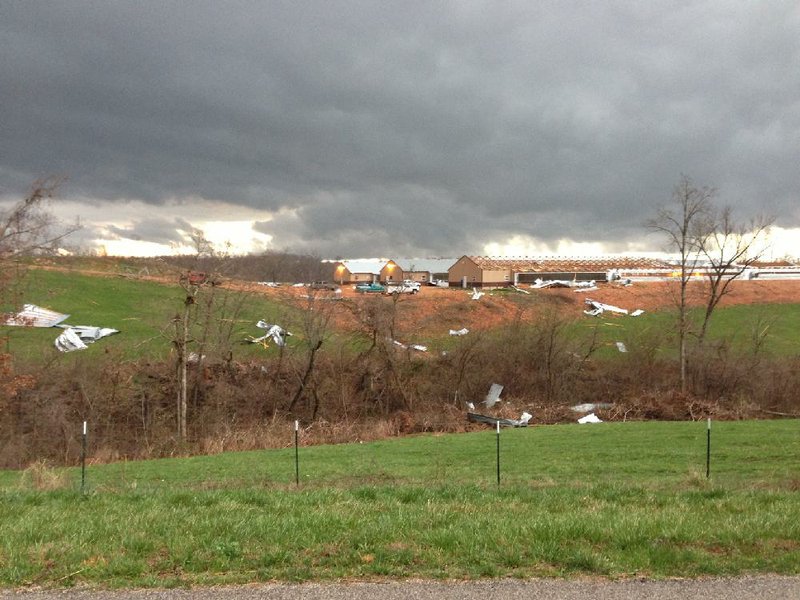 A tornado near Clifty in northern Madison County took the roof off one of Mike Ingram’s chicken houses on Wednesday.