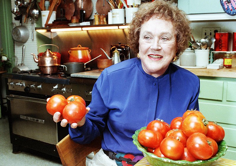 Jon Chase/The Associated Press CULINARY TREASURE: In this Aug. 13, 1992, file photo, chef and author Julia Child holds tomatoes in the kitchen at her home in Cambridge, Mass. More than a decade after her death, the foundation she created is launching a culinary award named in her honor. The Julia Child Award will be presented annually to someone who has improved how Americans think about food and cooking. The first winner will be announced in August and the award will be presented in October.