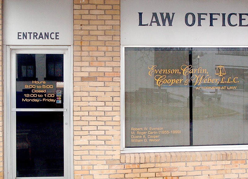 The law firm of Evenson, Carlin, Cooper and Weber is located on the square in Pineville.