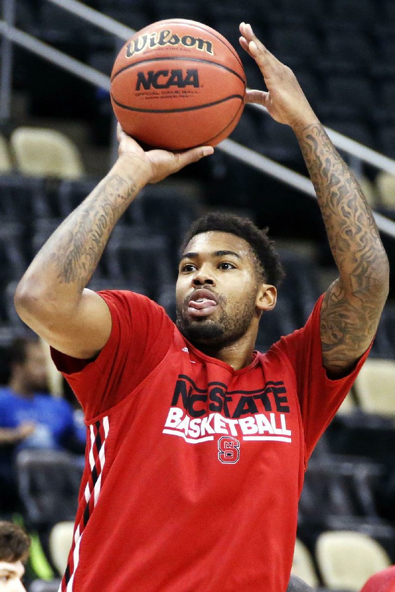 The North Carolina State Wolfpack (22-13), the eighth seed in the East and led by leading scorer Trevor Lacey (shown), meets fourth-seeded Louisville (26-8) tonight in a matchup of teams somewhat familiar with each other.