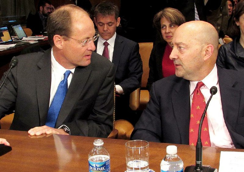 Westrock Group CEO Scott Ford (left) and retired Adm. James Stavridis prepare Thursday to testify before the Senate Appropriations Subcommittee on State, Foreign Operations and Related Programs. 